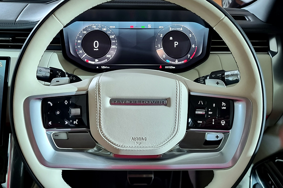 Your vantage point from behind the wheel. Full-digital dash is sleek.