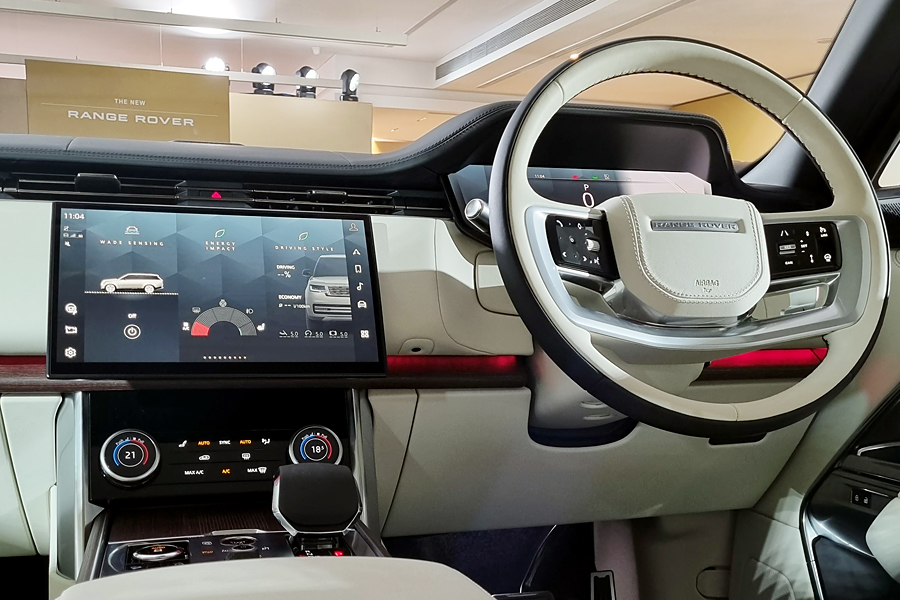 The 13.1-inch touchscreen houses all the critical controls for the car, but it's good to see physical knobs for the airconditioner