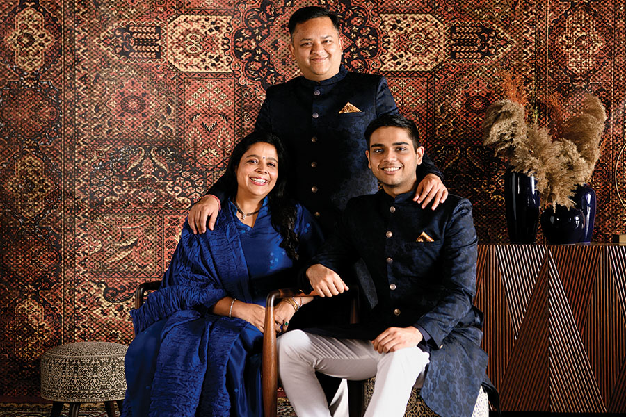 Ravi Modi (centre) with wife, Shilpi Modi, who sits on Vedant Fashions’ board, and son, Vedant, the company’s chief marketing officer